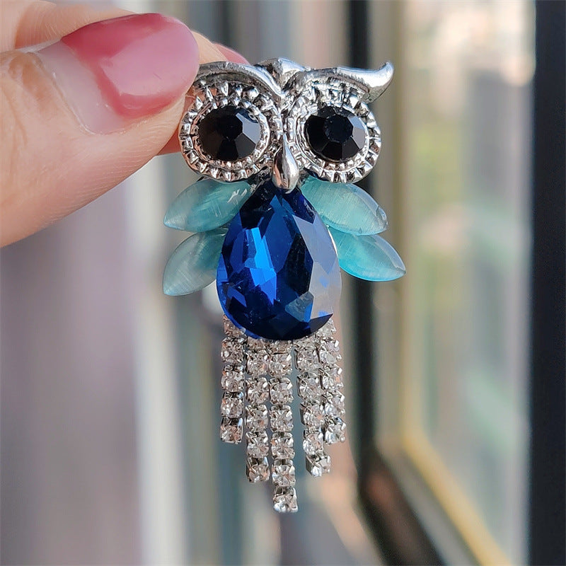 Green owl pin with sparkling embellishments