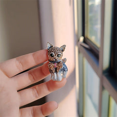 Close-up of the cat-themed brooch design