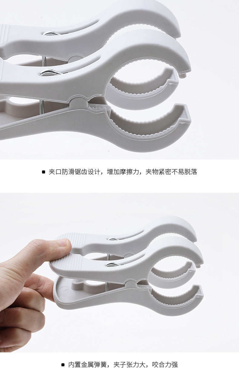 Light blue plastic clothespins for laundry