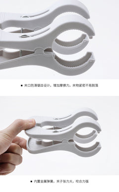 Light blue plastic clothespins for laundry