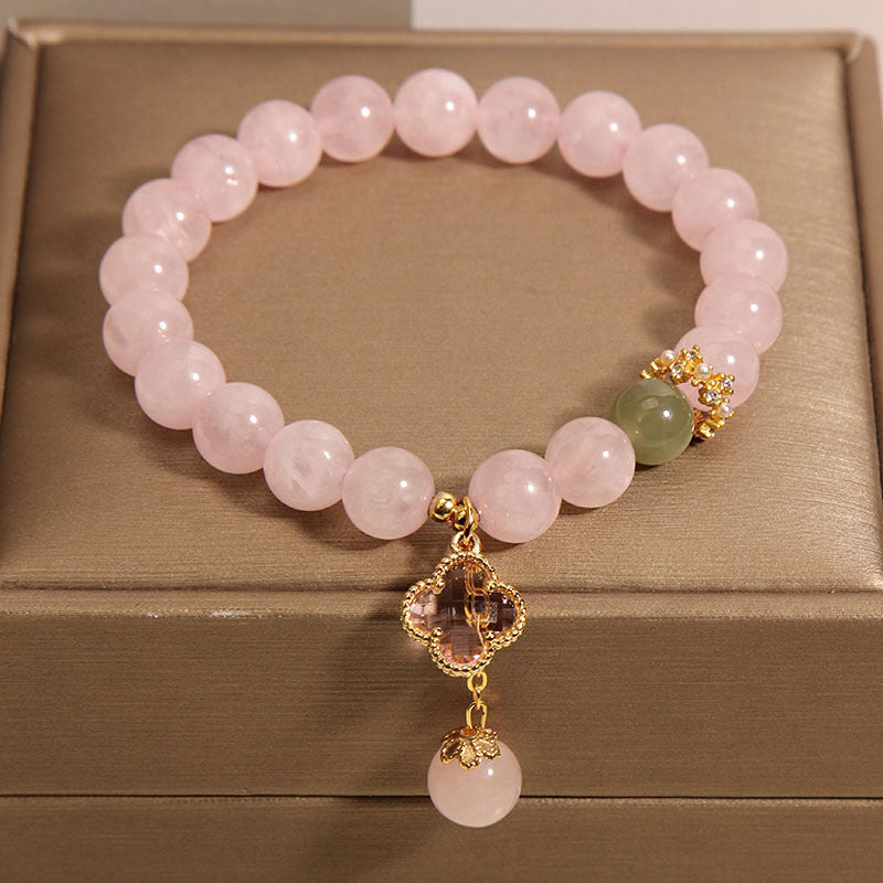 Stylish pink quartz bracelet displayed elegantly