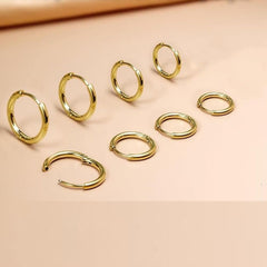 Steel grey hoop earrings against white background