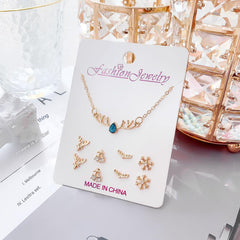 Stylish gold jewelry featured on a model