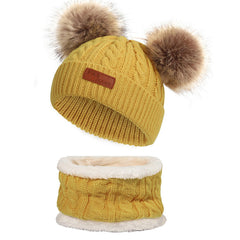 Kids winter knit hat with pom-pom in yellow