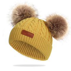 Cozy winter accessories for children on display