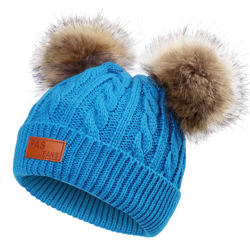 Detail of pom-pom on children's winter hat