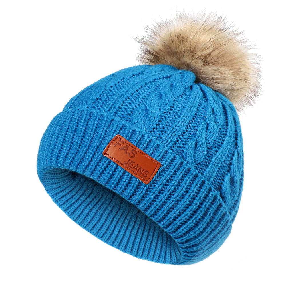 Detail of pom-pom on children's winter hat