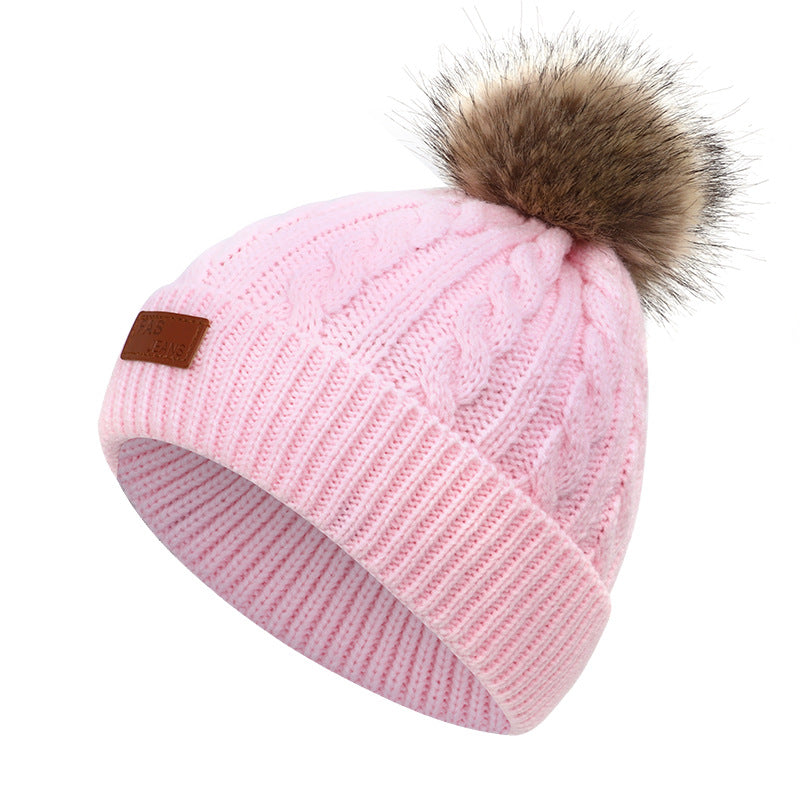 Kids wearing winter hat and scarf outdoors