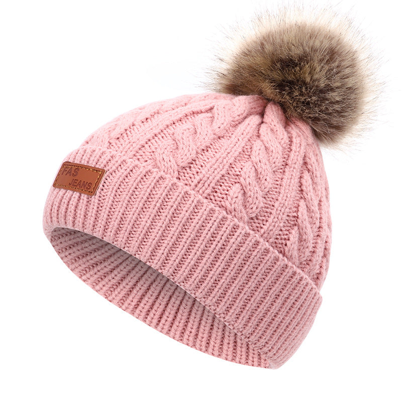 Kids winter knit hat with pom-pom in yellow