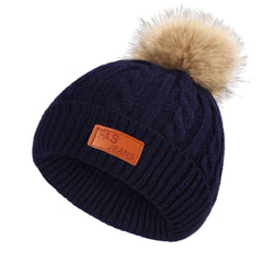 Cozy winter accessories for children on display