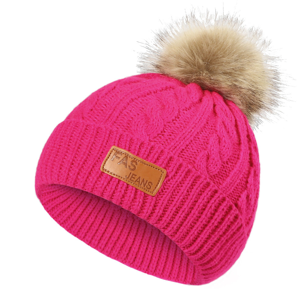 Cute pom-pom knit hat in black for kids