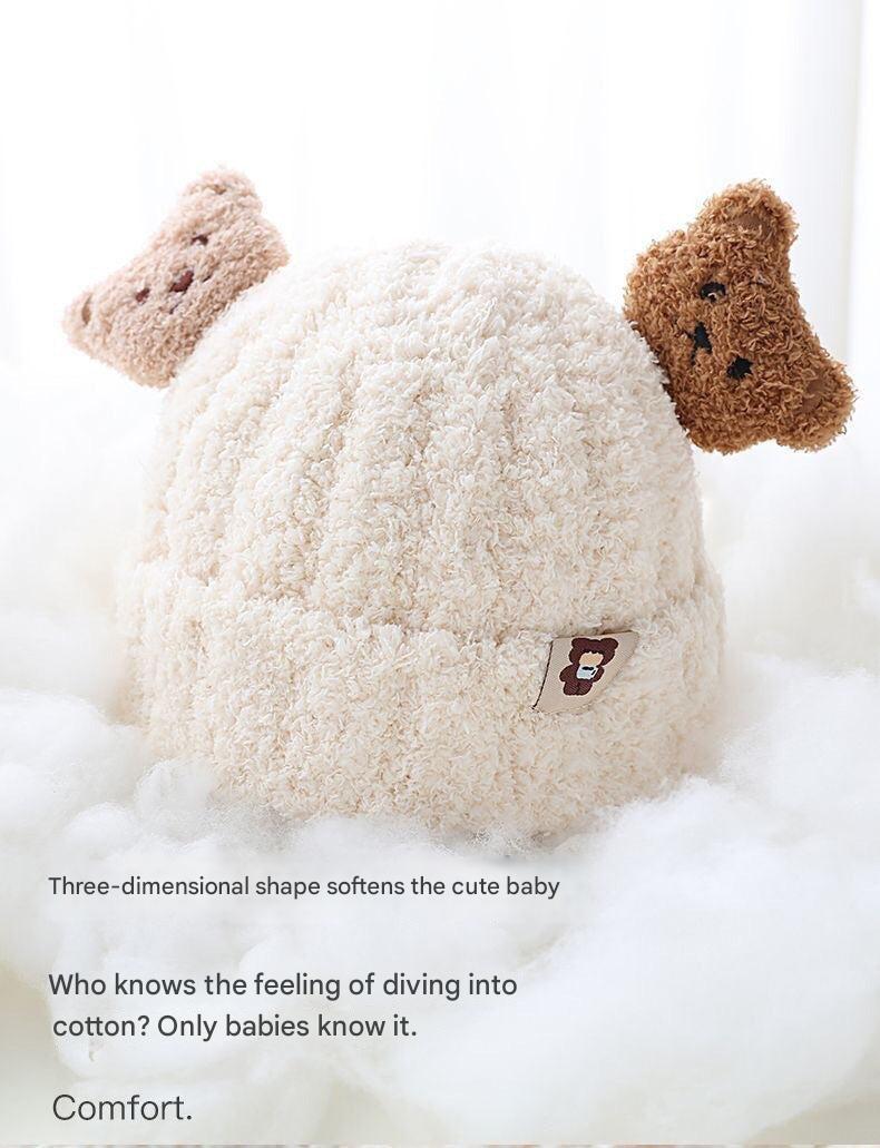 Baby winter gear with a cute bear design