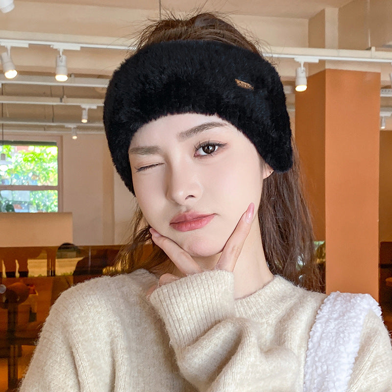 Close-up of a women's ear warmer beanie from the top view