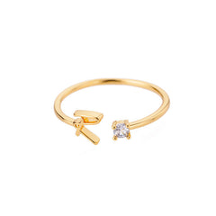 customisable gold ring displayed on cushion