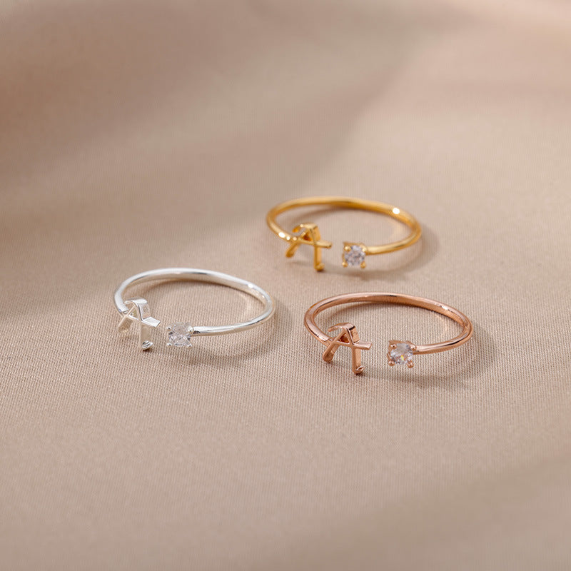 customisable gold ring displayed on cushion