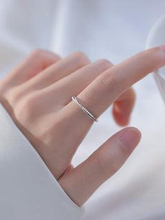 Elegant geometric ring with rhinestones in silver