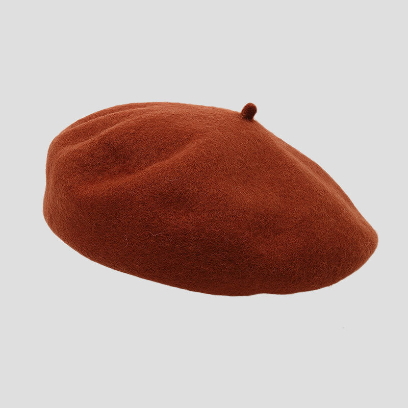 Warm wine red wool beret for winter occasions