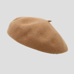 Close-up of round top wool beret design