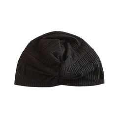 navy blue stylish beanie worn outdoors