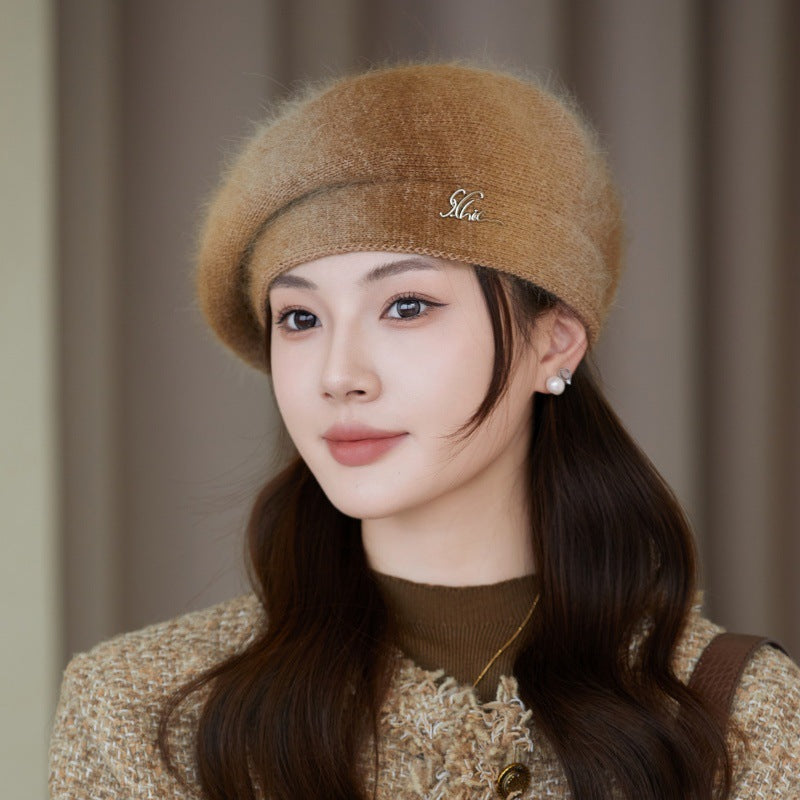 Rabbit fur beret displayed in gray colour
