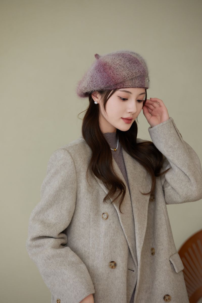 Elegant winter beret hat worn by a model