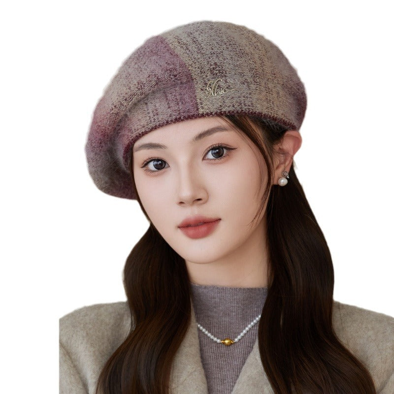 Elegant winter beret hat worn by a model