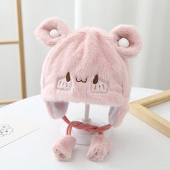 Close-up of plush cartoon baby beanie hat