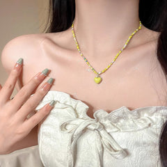 Casual outfit styled with heart bead necklace