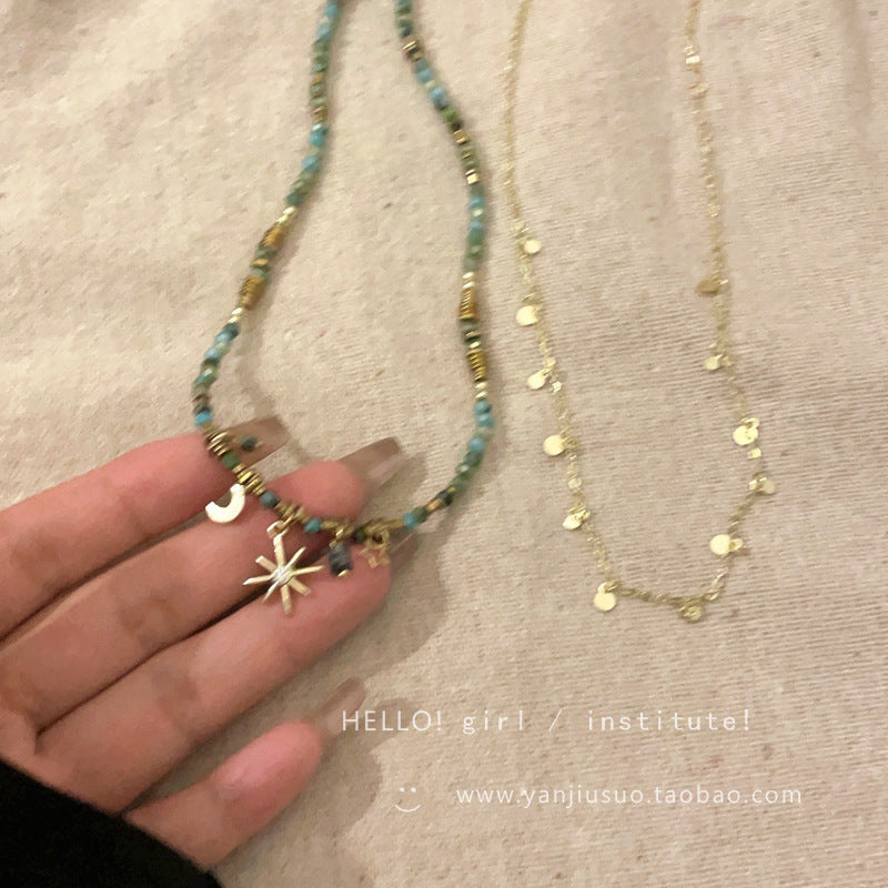 Layered vintage necklace showcasing unique geometric design