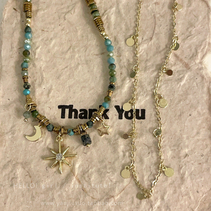 Elegant vintage layered necklace on display