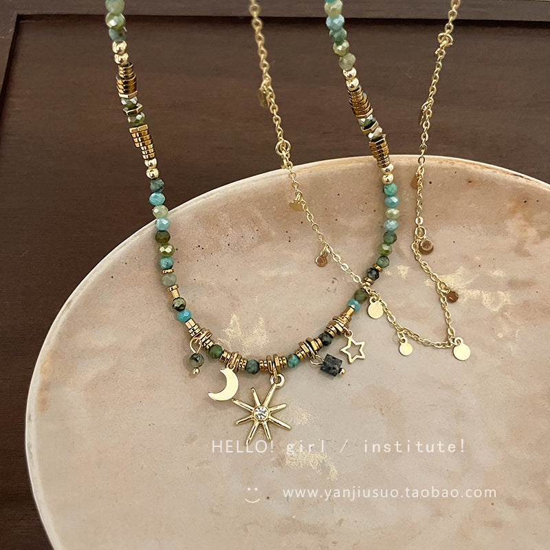 Necklace worn with stylish winter outfit