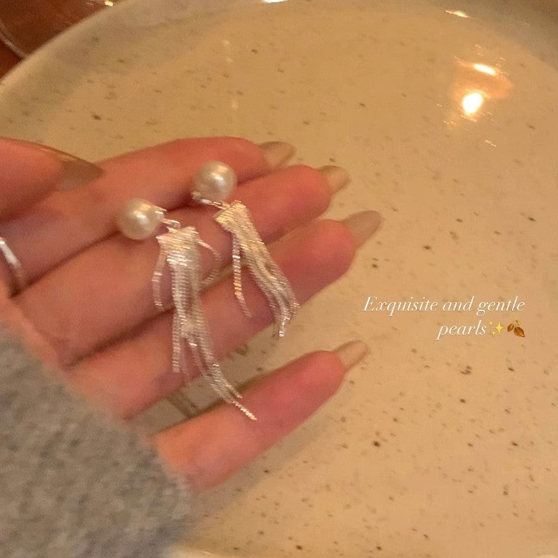 Elegant pearl tassel earrings with geometric design 2