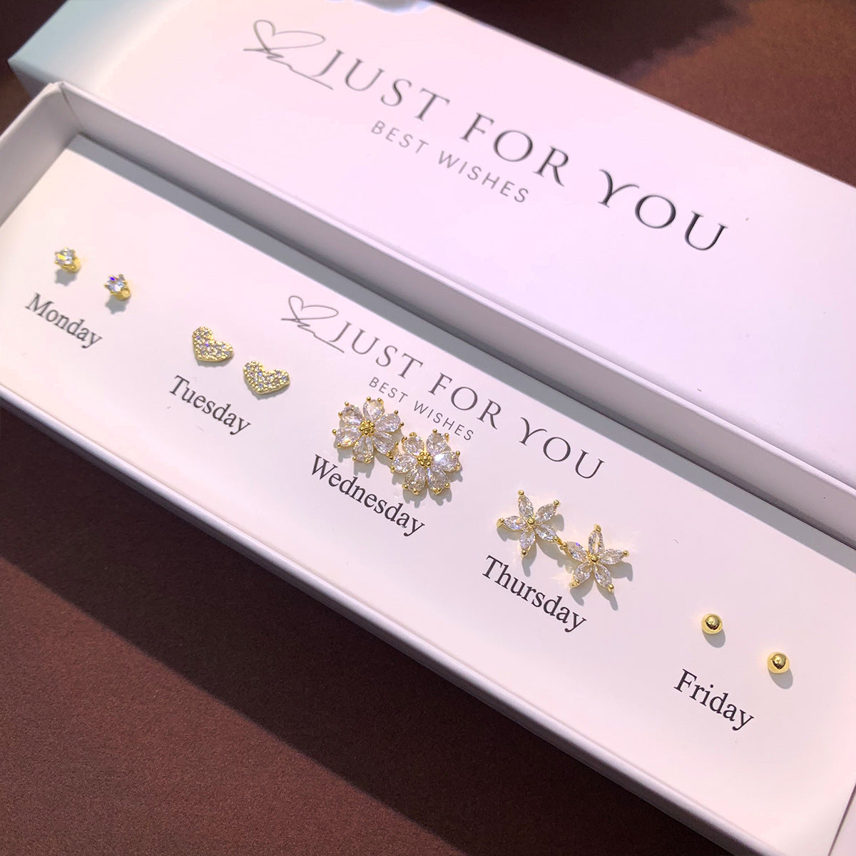 Everyday wear S925 silver earrings flat lay
