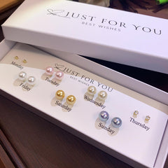 Everyday wear S925 silver earrings flat lay