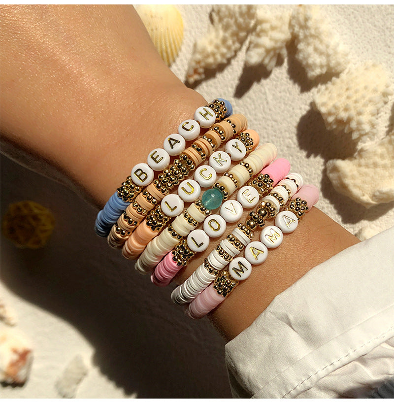 Fashionable clay bracelet on a white background