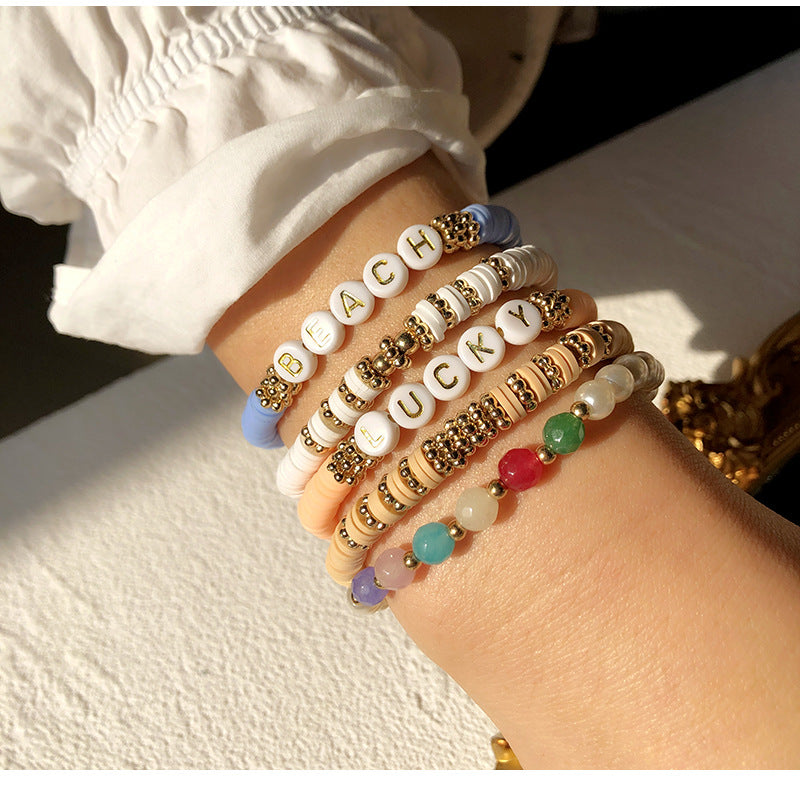 Trendy women's friendship bracelet displayed on a table