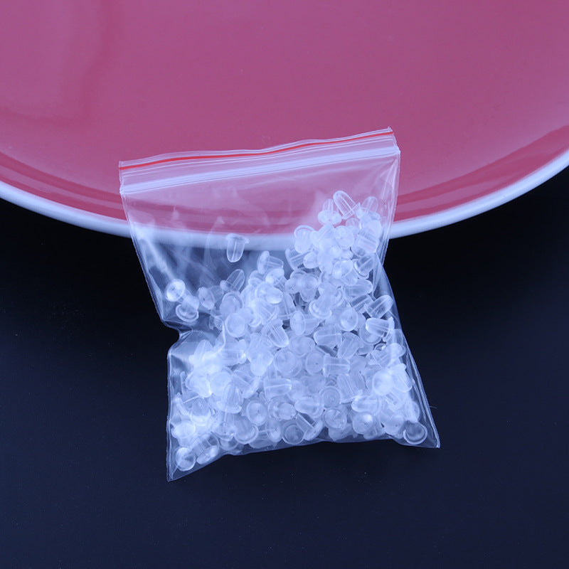 Silicone ear plugs shown in a clear packaging