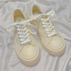 Violet-pink galaxy shoelaces featured prominently
