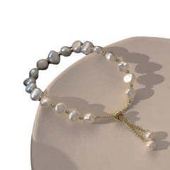 Elegant faux pearl bracelet showcasing various angles