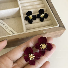 Floral Earrings showcased on a model