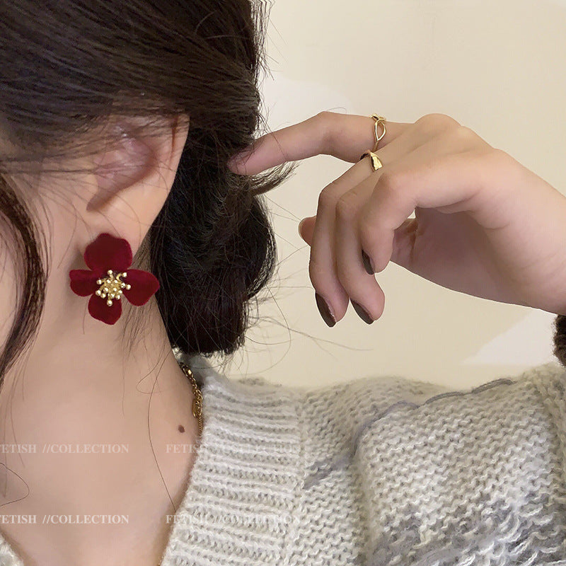Elegant Earrings on a stylish fabric surface