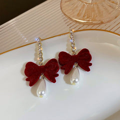 Chic burgundy velvet bow earrings elegant design