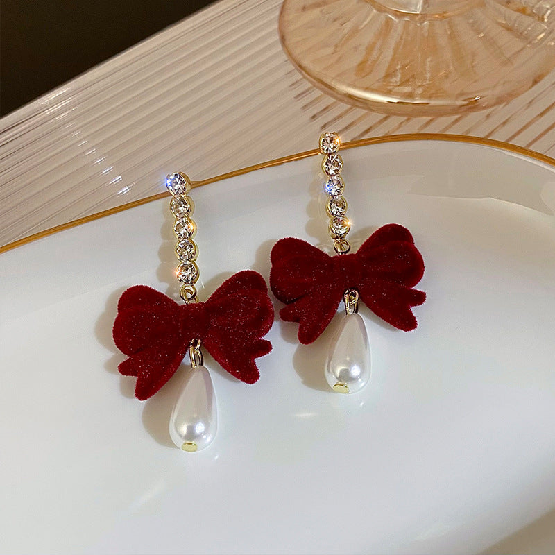 Chic burgundy velvet bow earrings elegant design