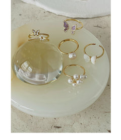 Elegant butterfly ring on mannequin hand