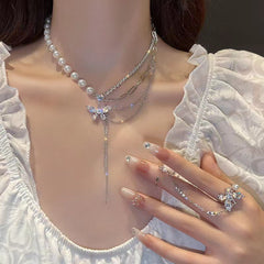 Adjustable butterfly pearl necklace