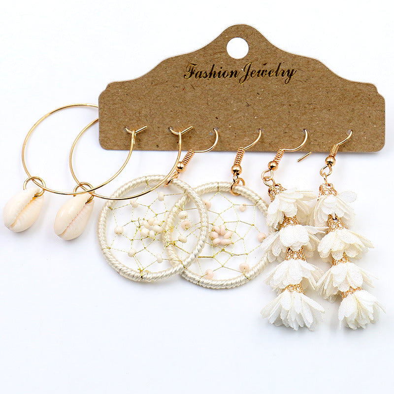 High-quality shell earrings in golden colour
