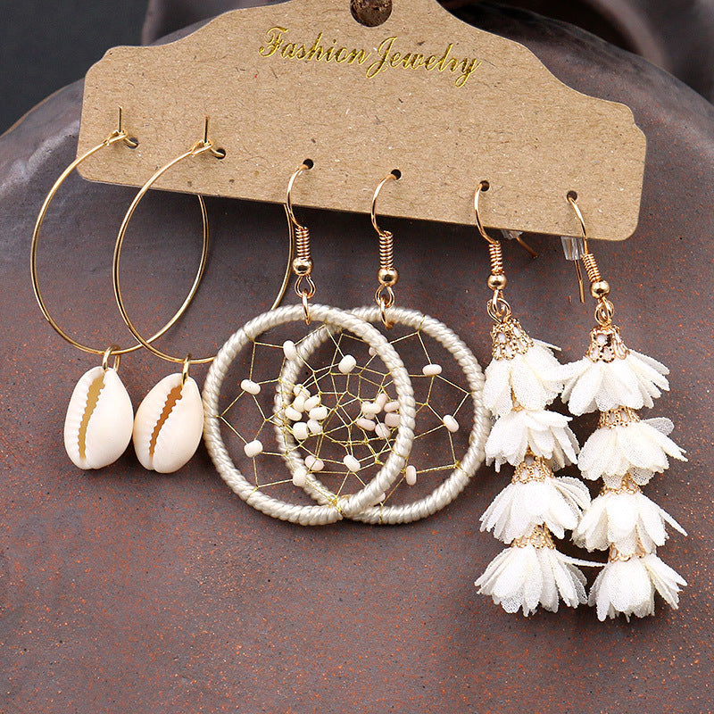Detailed view of shell earrings