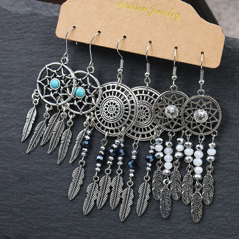 Close-up of waterdrop earrings in vibrant colours image 2
