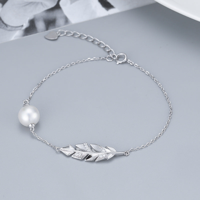 stylish display of silver bracelet