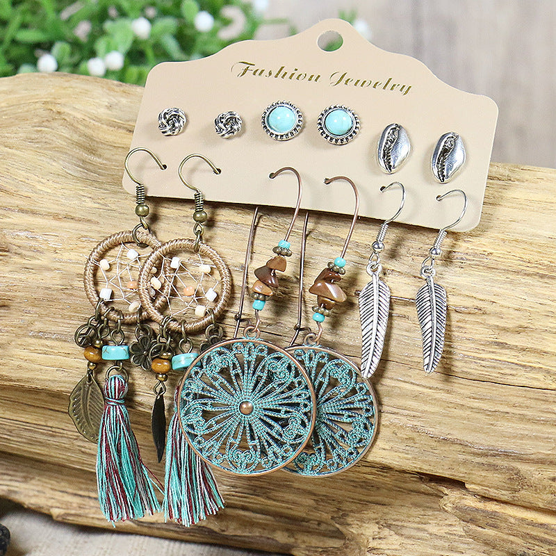 Close up of Leaf and Feather Dangle Earrings design